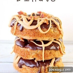 A delicious Elvis donut topped with chocolate glaze, peanut butter, and bacon.