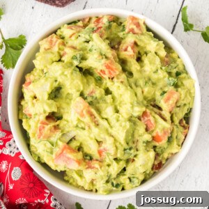 Close-up of freshly made guacamole in a bowl.