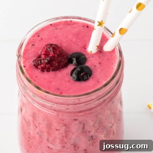 closeup of banana berry smoothie in a glass