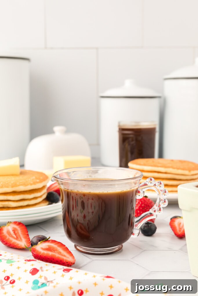 Golden Vanilla Pancake Nectar 5 A bottle of homemade vanilla pancake syrup rests elegantly on a kitchen counter, ready to enhance any breakfast spread.