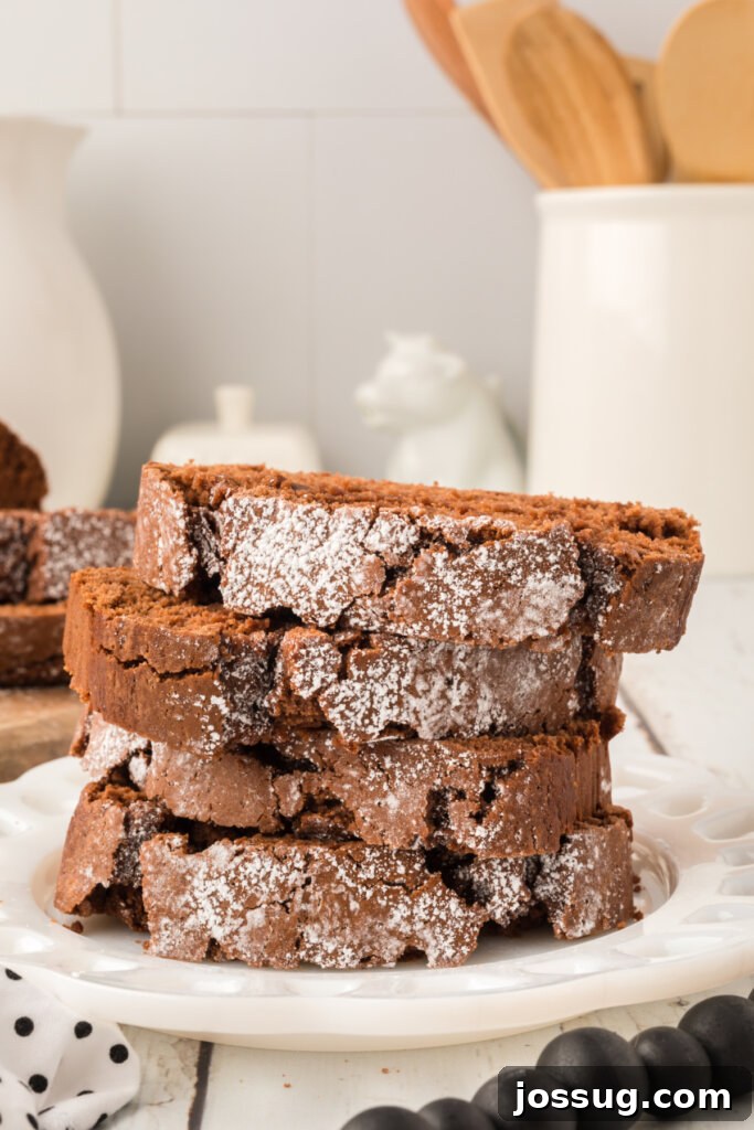 Perfectly Stacked Slices of Moist Chocolate Pound Cake on a Plate