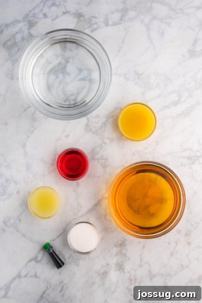 Biohazard Brew 3 Glass bowls of ingredients including apple juice, pineapple juice, lime juice, grenadine, sugar, and green food coloring on a sleek marble surface, ready for mixing into the Halloween punch.