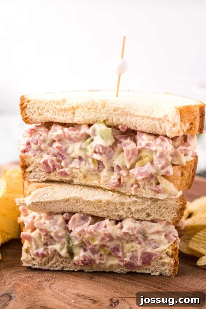 ham salad sandwich cut in half with the halves stacked
