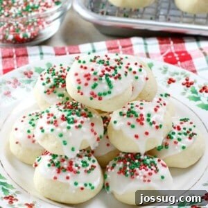 Fragrant Italian Anise Delights 2 A beautifully arranged plate of soft Italian Anise Cookies, glazed and adorned with colorful nonpareils.