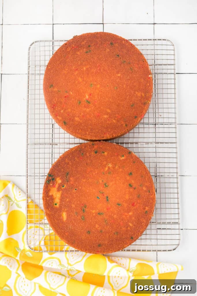 Whimsical Lemon Sprinkle Cake 7 Lemon Funfetti Cakes cooling on cooling rack
