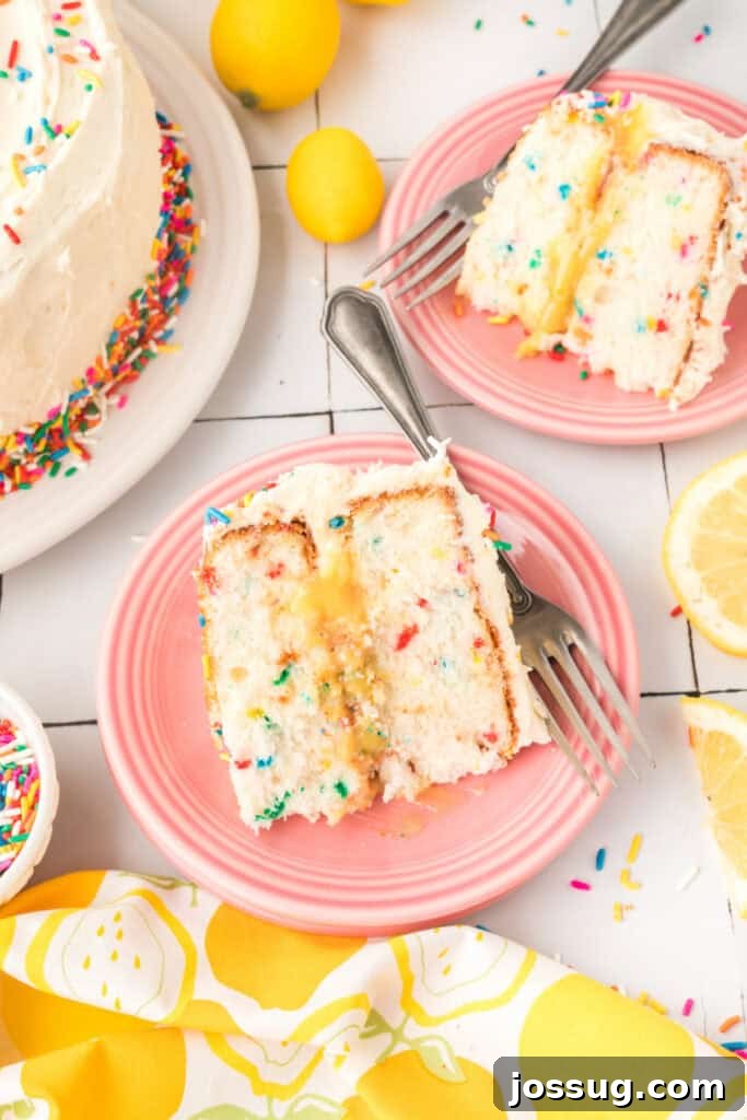 Whimsical Lemon Sprinkle Cake 10 slice of lemon funfetti cake on pink plate