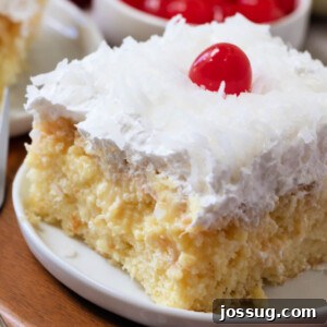 Slice of Pina Colada Poke Cake