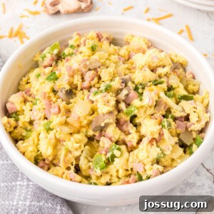 Denver Omelet Scramble in a bowl, a perfectly cooked and savory dish.