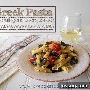 Sun-Kissed Greek Pasta 2 A vibrant bowl of Greek Pasta with fresh tomatoes, spinach, and crumbled feta cheese