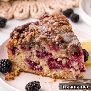 slice of blackberry lemon coffee cake on plate