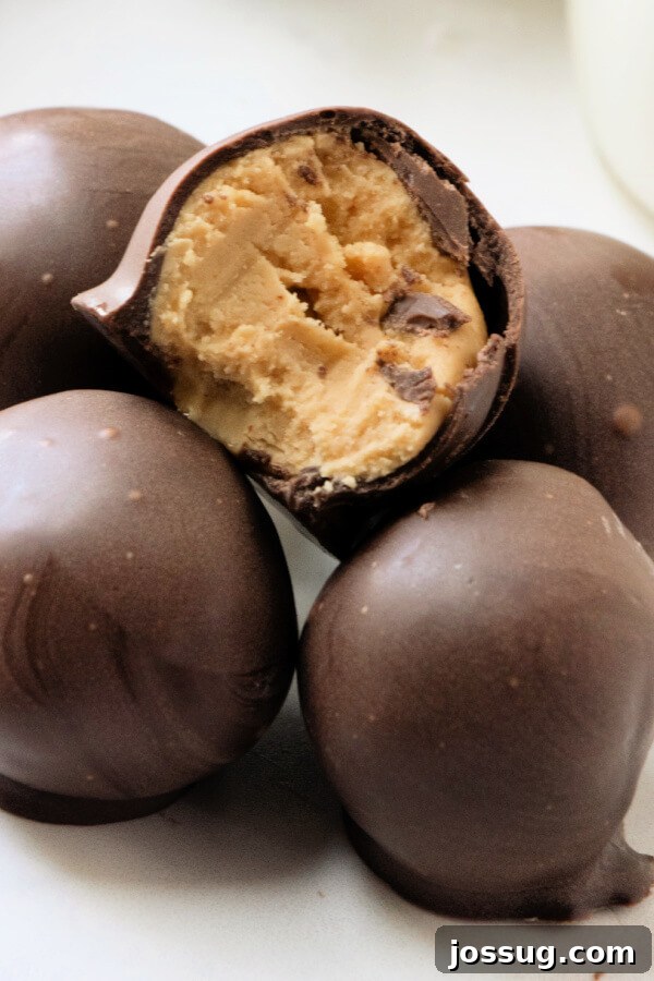 Decadent Peanut Butter Truffles 7 Several Buckeyes, showing the characteristic chocolate coating with a peanut butter center exposed