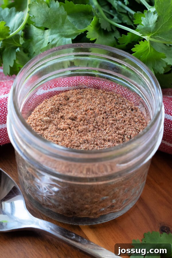 DIY Taco Spice Mix 6 Homemade taco seasoning stored in a clear glass jar with a label, ready for future use