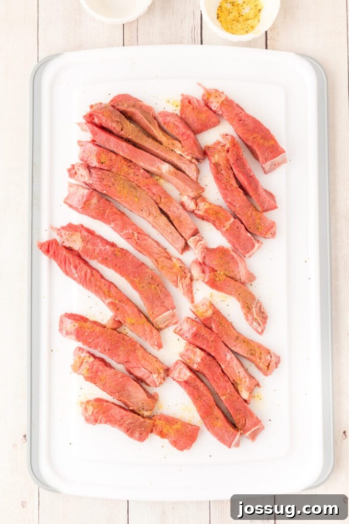 Crispy Steak Strips 6 Season with lemon pepper and salt.