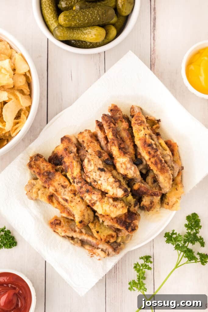 Crispy Steak Strips 10 Drain on paper towels. Repeat with remaining strips. Serve hot.