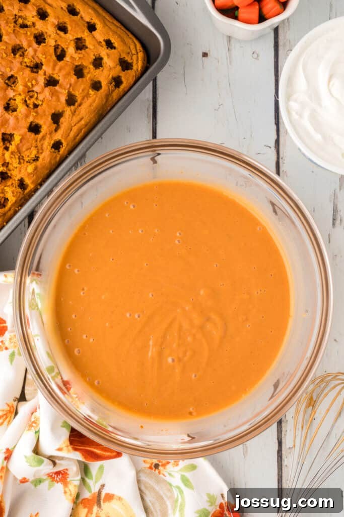 Decadent Pumpkin Spice Poke Cake 10 Smooth, fully whisked pumpkin pudding ready to pour over the cake