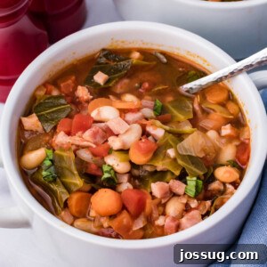 bowl of ham and bean soup with cabbage