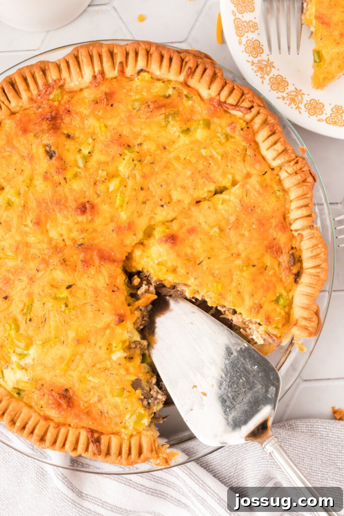 Savory Roast Beef and Gruyère Quiche 3 whole roast beef quiche in a pie plate, freshly baked and golden