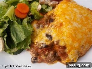 Zesty Taco Lasagna Bake 2 Delicious Taco Lasagna ready to be served, topped with melted cheese.