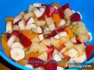 A delightful and refreshing Summer Fruit Salad prepared with fresh, seasonal fruits.