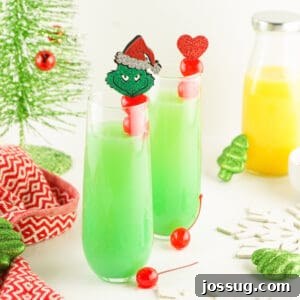 Two bright green Grinch Mimosas