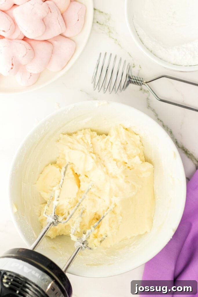 Vanilla buttercream filling whipped smooth and creamy in a mixing bowl.