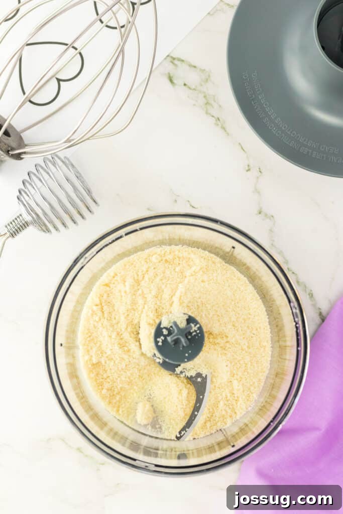 Almond flour finely ground in a food processor for making macaron shells.