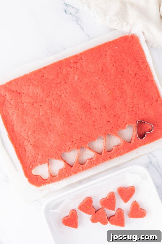 Strawberry Cream Truffle Hearts 10 Heart-shaped strawberry cake truffles cut from the pressed cake mixture