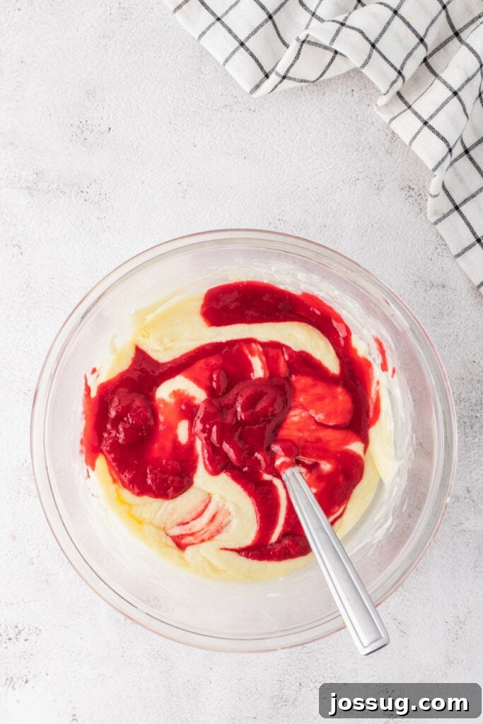 Raspberry puree swirled into white chocolate fudge