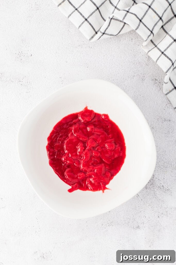Strained raspberry puree in a bowl