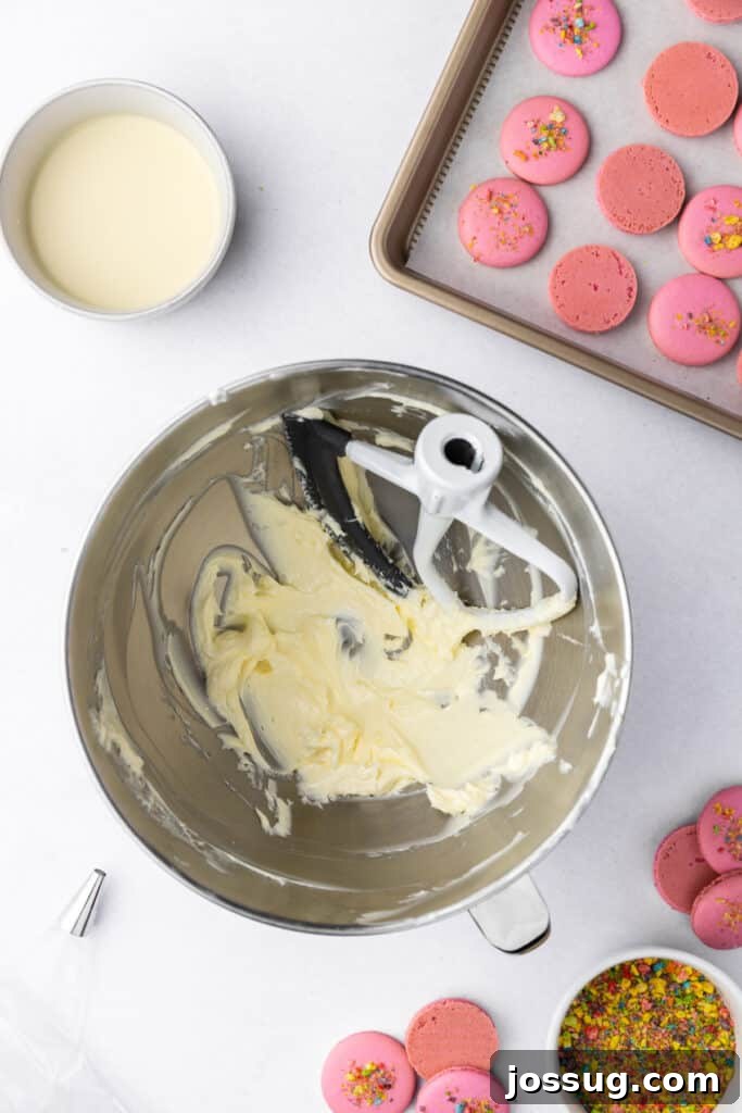 buttercream base in a stand mixer bowl before adding powdered sugar