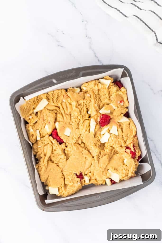 White Chocolate Raspberry Bliss Bars 8 Batter spread into pan
