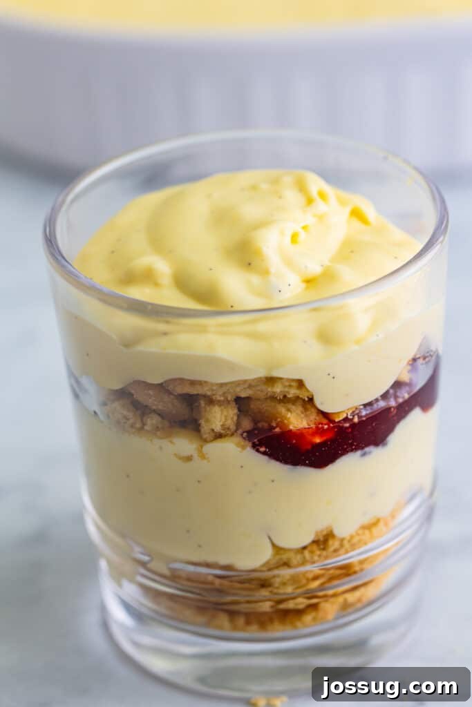 Creme Brulee Dream Trifle 16 Vanilla custard smoothed on top of the layered creme brulee trifle, creating a base for the caramelized sugar.