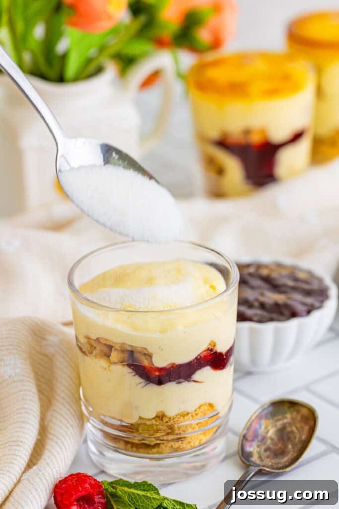 Creme Brulee Dream Trifle 17 Granulated sugar sprinkled evenly over the top of a creme brulee trifle, ready for torching.