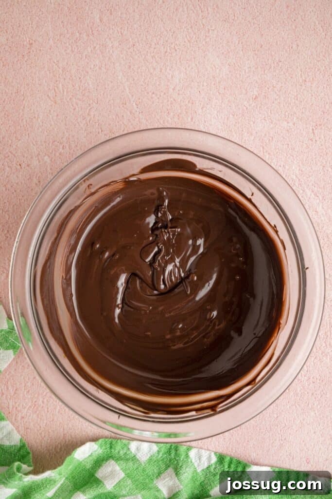 Buttercream Bliss Bites 14 Melted chocolate in a glass bowl