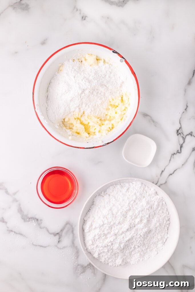 Adding Powdered Sugar to Cherry Buttercream