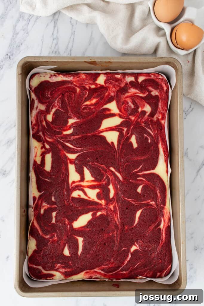 Baked red velvet cheesecake brownies with marbled top