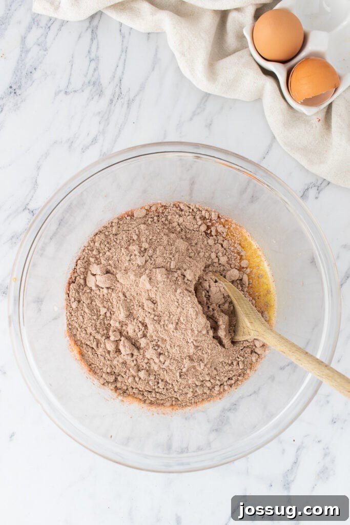 Red velvet cake mix added to the bowl