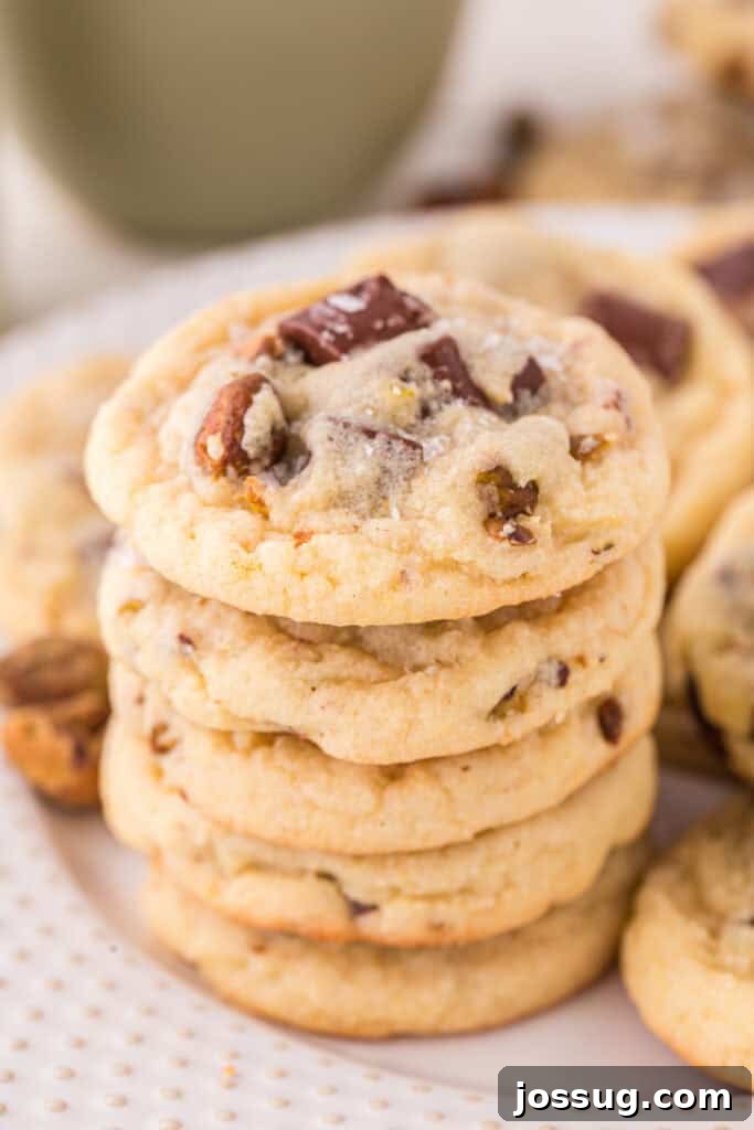 Pistachio Dream Cookies 10 Stack of pistachio chocolate chunk cookies with salt.