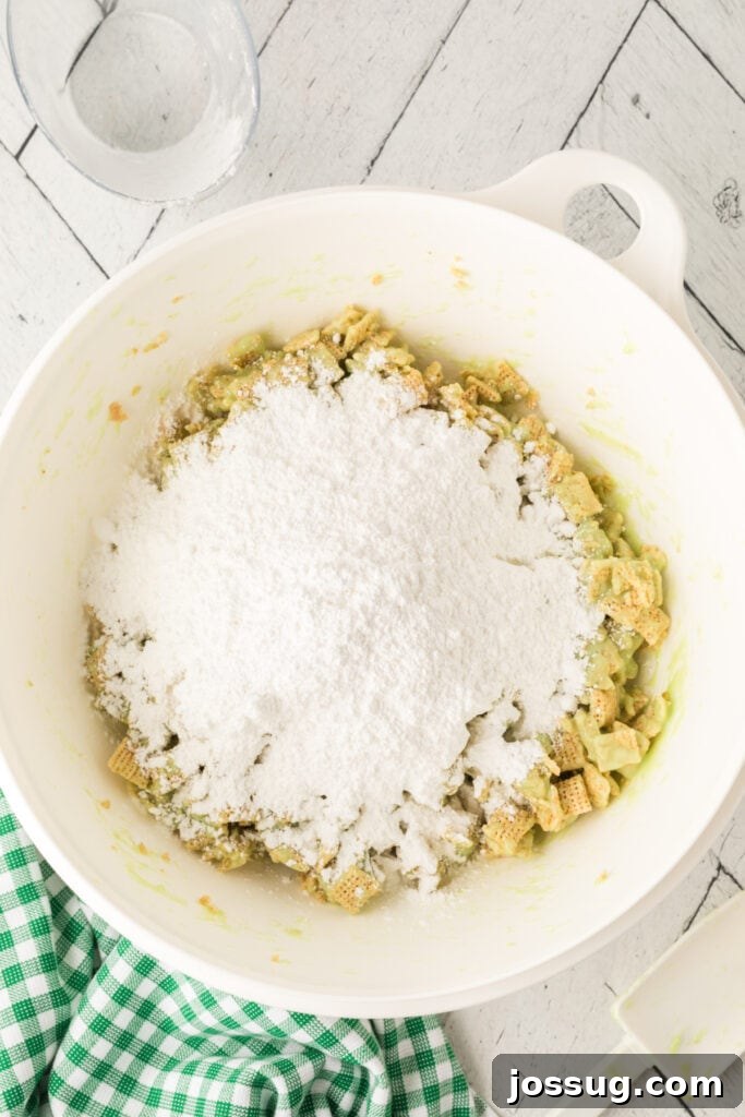 Pistachio Puppy Chow 11 Adding powdered sugar.