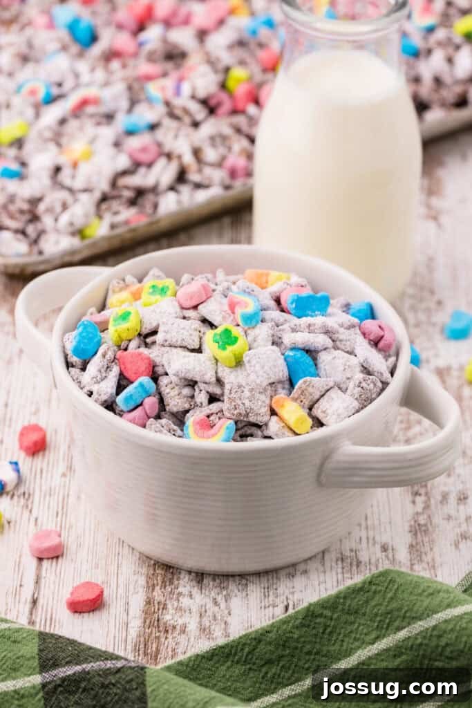 Bowl of Irish Cream Muddy Buddies with Lucky Charms marshmallows