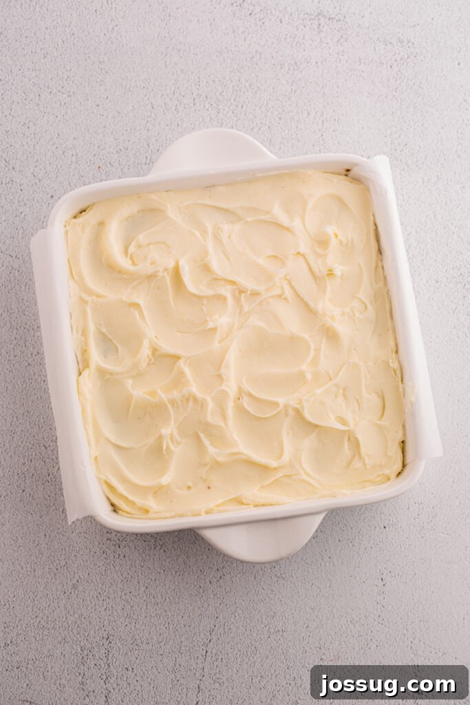 Banana Bread Brownies 14 Square pan of banana brownies spread with cream cheese frosting