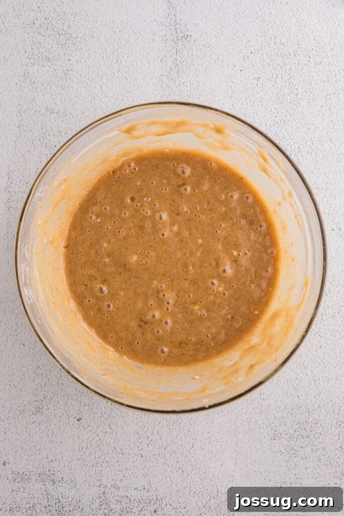 Banana Bread Brownies 8 Glass bowl with fully mixed banana brownie batter