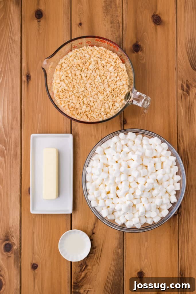 Ingredients for Lemon Rice Crispy Treats: Crispy Rice Cereal, Mini Marshmallows, Butter, and Lemon Extract