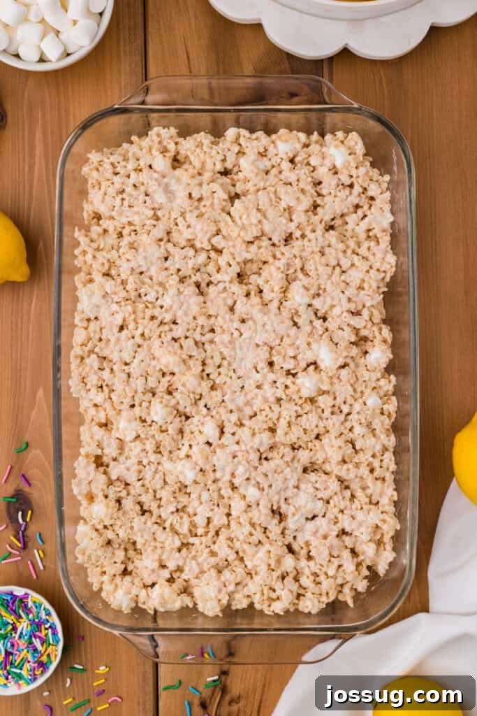 Rice Crispy Treat Mixture Pressed into a Glass Baking Dish