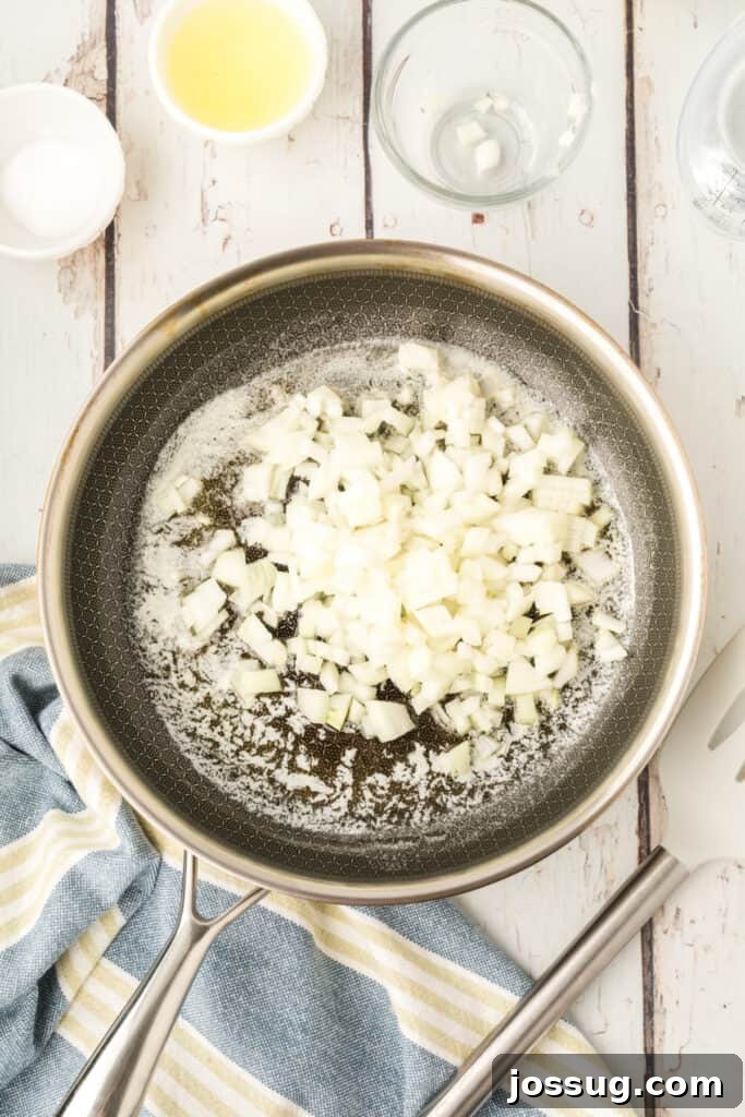 chopped onion added to melted butter in a skillet