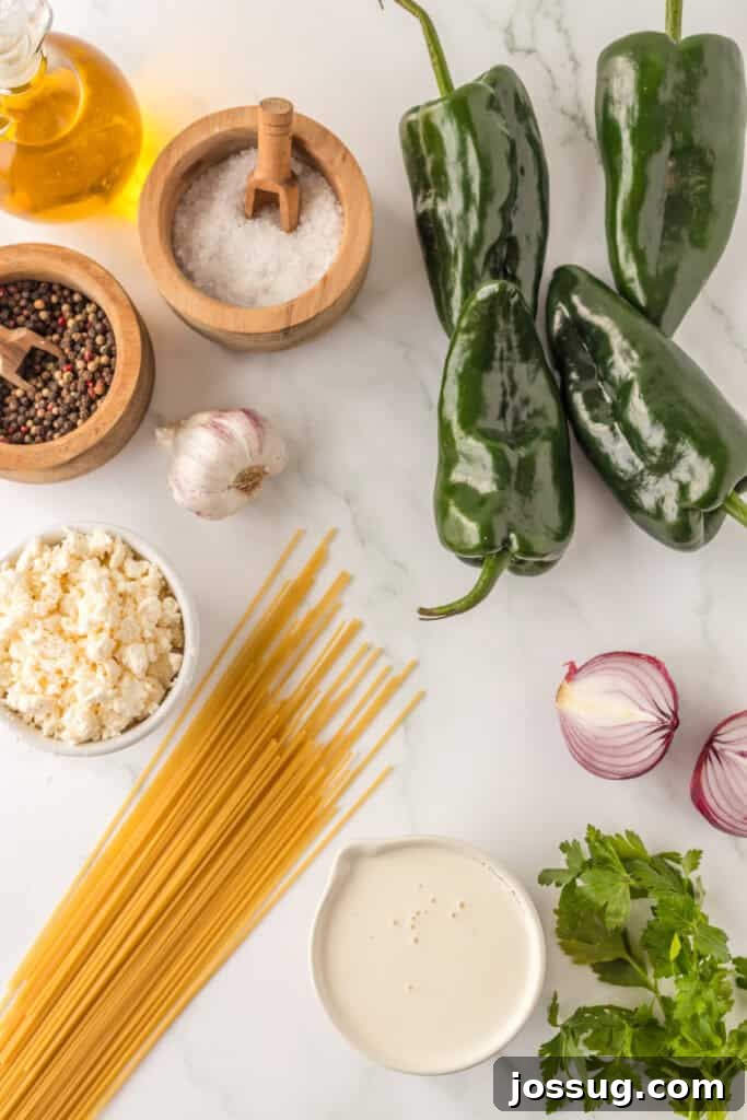 Creamy Mexican Verde Spaghetti (Espagueti Verde) 3 Ingredients for Mexican Green Spaghetti including poblano peppers, spaghetti, queso fresco, cream, garlic, and red onion