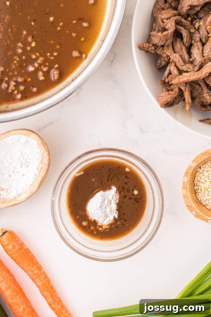 Cornstarch added to bulgogi sauce in a small bowl for thickening Korean Beef Bulgogi sauce