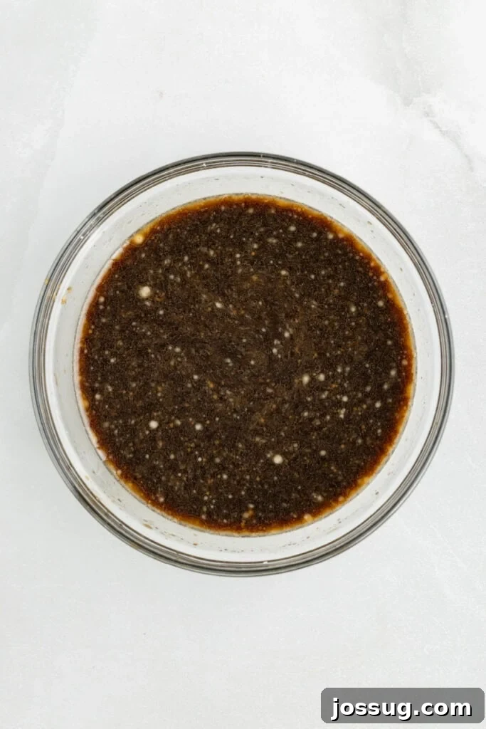 Homemade teriyaki sauce mixed in a glass bowl for Chicken Teriyaki recipe