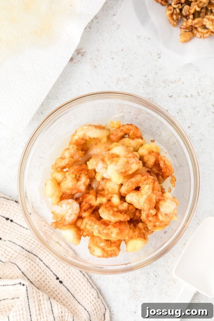 Crispy Honey Walnut Shrimp Recipe: Restaurant-Style at Home 16 Crispy fried shrimp in a bowl before adding Honey Walnut Shrimp sauce