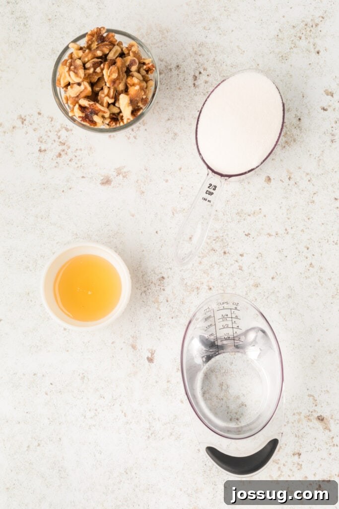 Crispy Honey Walnut Shrimp Recipe: Restaurant-Style at Home 3 Ingredients for Honey Walnut Shrimp including walnuts, granulated sugar, honey, and water on a light background